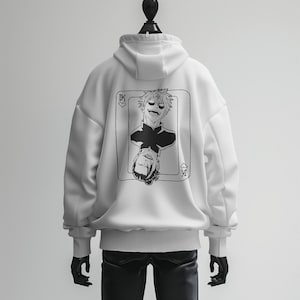 May include: White hoodie with a black and white illustration of a playing card with a man's face on it. The card is the King of Hearts.
