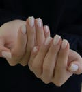Milky White Press On Nails: Hand Painted Y2K Chrome Gel Nails product logo