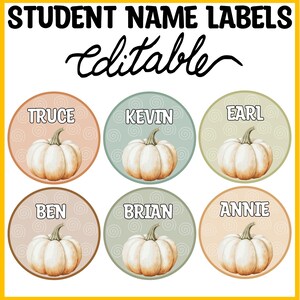 May include: A set of six circular student name labels featuring a pumpkin illustration on each. The labels are arranged in two rows and include the text "STUDENT NAME LABELS" and "editable" at the top. Each label displays a unique name: Truce, Kevin, Earl, Ben, Brian, and Annie, set against muted pastel backgrounds with a subtle swirl pattern.