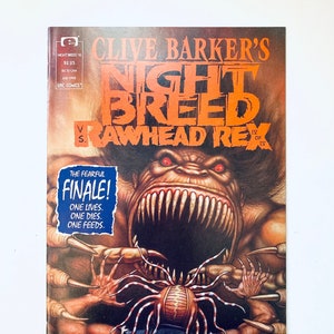 May include: A comic book cover for Clive Barker's Nightbreed vs. Rawhead Rex. The cover features a monstrous creature with sharp teeth and claws, with the text "THE FEARFUL FINALE!" and "ONE LIVES. ONE DIES. ONE FEEDS." The comic is from July 1992.