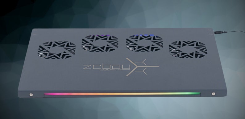 May include: A gray laptop cooling pad with three fans and a rainbow LED light strip. The pad has a black and gold logo that says "zebau" with the text "cyberware" underneath.