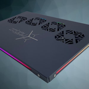 May include: A black laptop cooling pad with a Zealou logo and three circular fan vents. The pad has a multi-colored LED light strip along the edge.