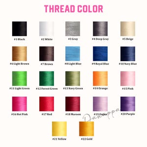 May include: A chart showing 22 different thread colors with their corresponding numbers. The colors include black, white, gray, beige, light brown, brown, light blue, royal blue, navy blue, light green, forest green, navy green, orange, pink, hot pink, red, maroon, purple, yellow, and gold.