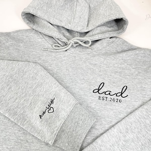 Embroidered Dad Est with Kids Names and Heart on Sleeve Hoodie,Dad Est Sweatshirt,Unique Gifts for Dad, Fathers Day Gifts