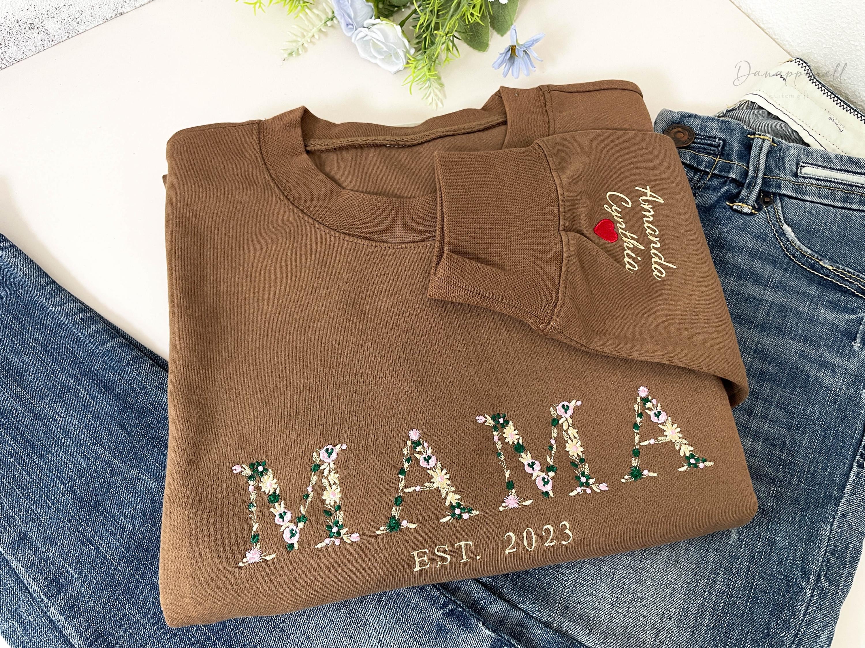 thumbnail interactive-video image 1 of Personalized Embroidered 'Mama EST' Sweatshirt - Custom Gift For Mom For Christmas, Birthday Or Mother's Day 1 of 5