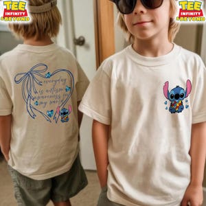 May include: Off-white t-shirts featuring a cartoon Stitch character with an autism awareness puzzle piece design. One shirt has the text "everyday is autism awareness in my world" with a blue bow and heart design.