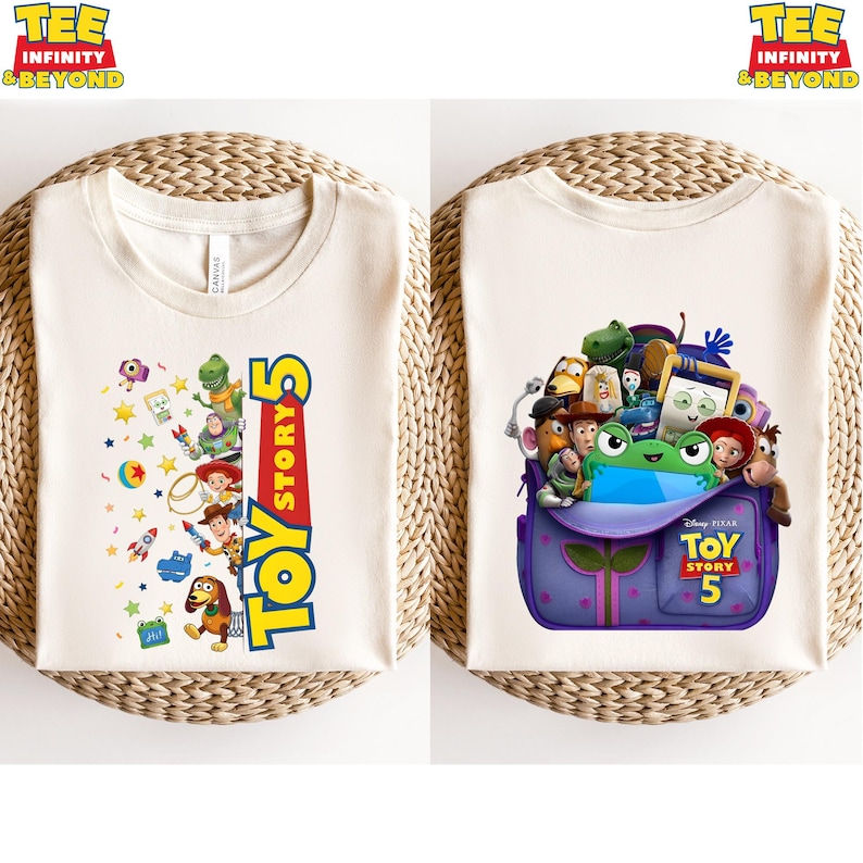 May include: A cream-coloured t-shirt featuring Toy Story 5 graphics. The left side shows characters like Woody, Buzz Lightyear, and Rex next to the Toy Story 5 logo. The right side displays a purple backpack filled with various movie characters.