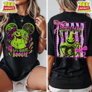 K&ouml;nnte beinhalten: Schwarzes T-Shirt mit einem neongr&uuml;nen Oogie Boogie-Design und dem Text "Let's Oogie Boogie" auf der Vorderseite. Die R&uuml;ckseite des Shirts hat ein passendes Design mit dem Text "Boogie Man".