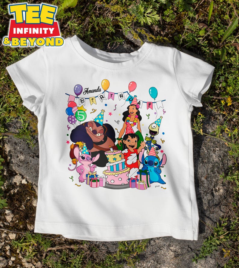 May include: White t-shirt with a colourful graphic of Lilo & Stitch characters at a birthday party. The design includes a cake, balloons, and the name "Amanda" with the number "5".