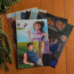 May include: A stack of illustrated art prints featuring colorful artwork. The prints showcase various scenes with figures in different settings. One print has the text "Moments Ago..." and another has the text "This better be an emergency..."