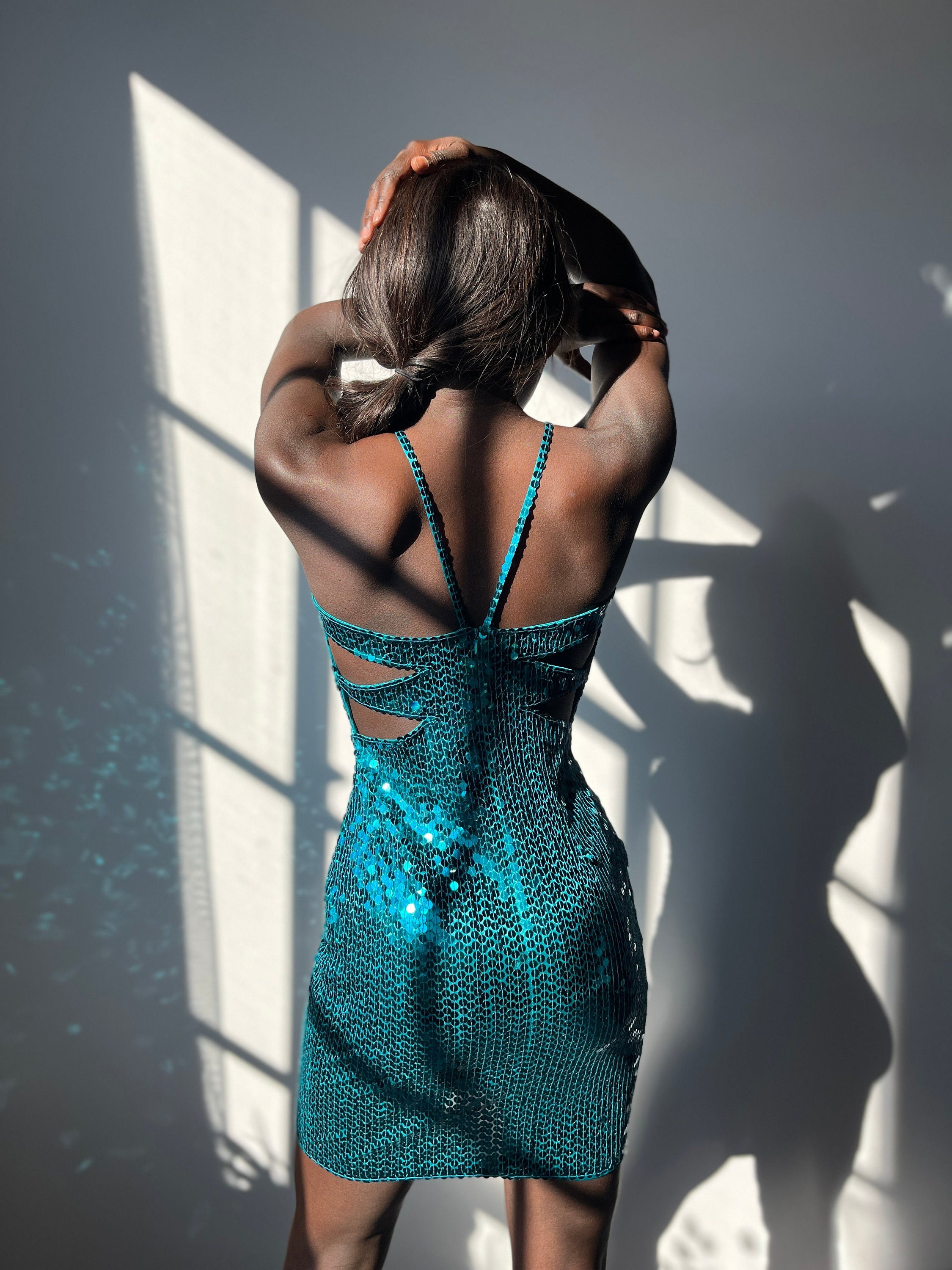 Blue sparkly bodycon dress top