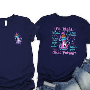 Navy blue t-shirt with a graphic design and text on the back, along with a pair of jeans and sneakers.