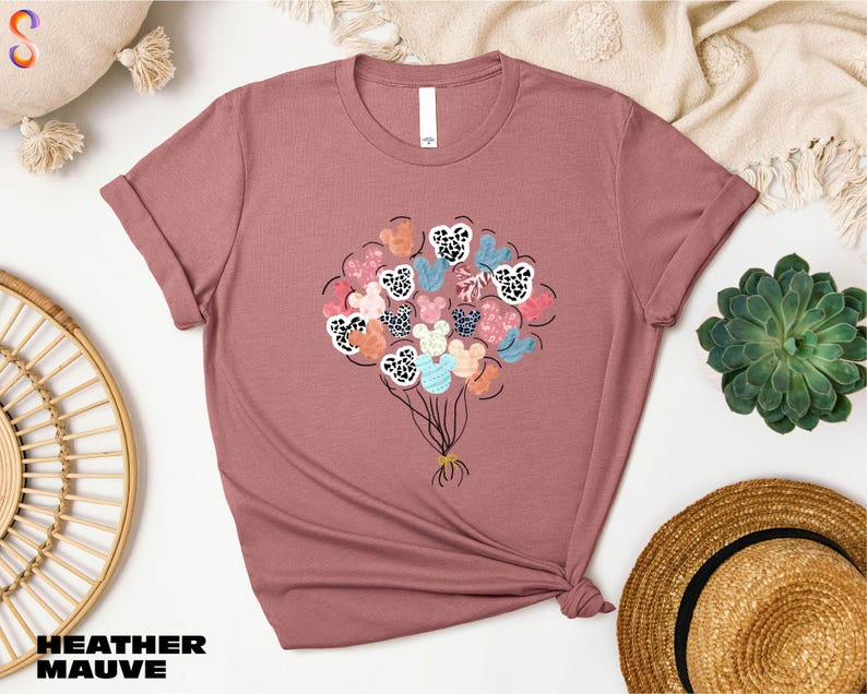a t - shirt with a bunch of flowers on it