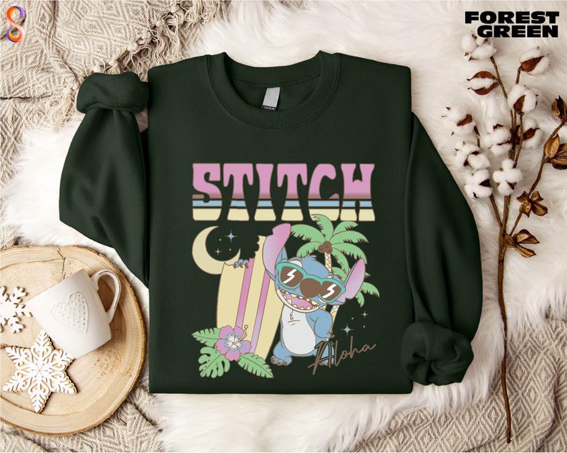 a green sweater with a cartoon character on it
