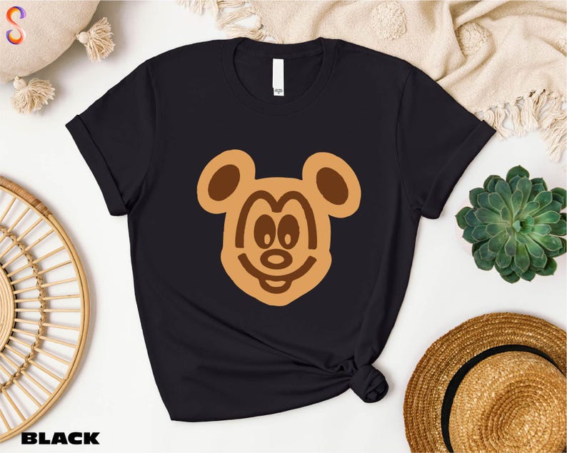 a t - shirt with a bear face on it