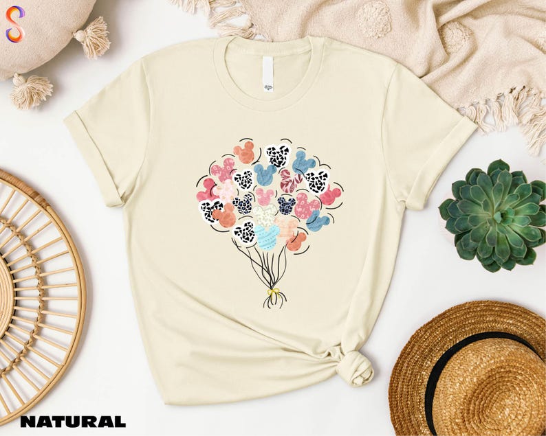 a t - shirt with a bunch of flowers on it