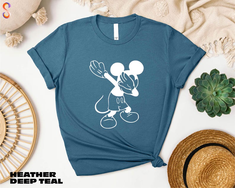 a t - shirt with a mickey mouse graphic on it