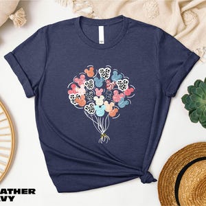 a t - shirt with a bunch of flowers on it