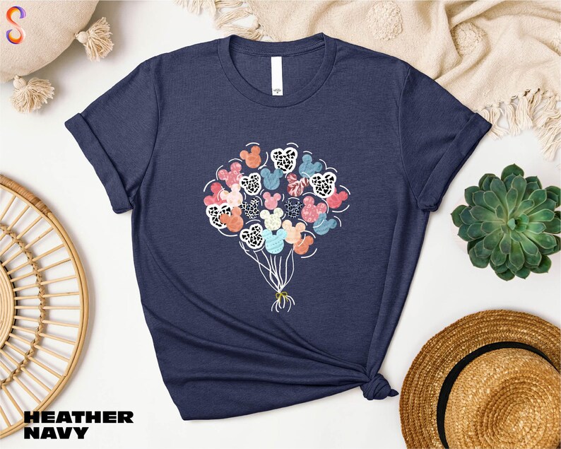 a t - shirt with a bunch of flowers on it