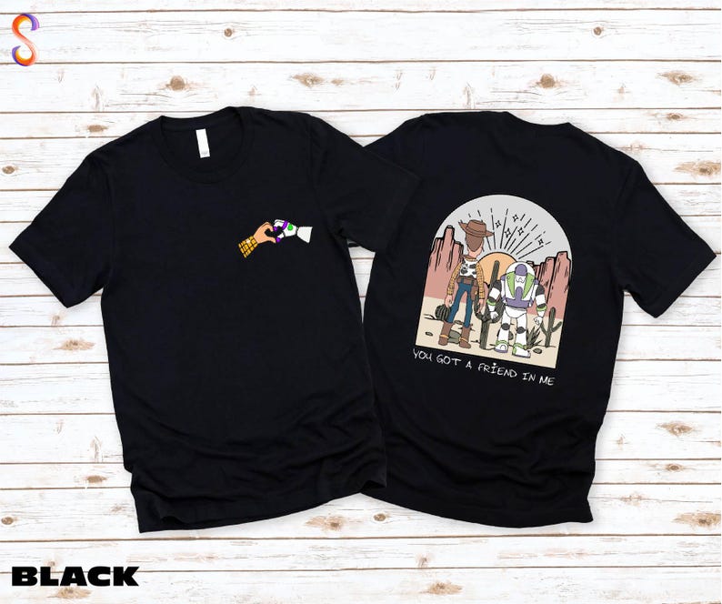 a black t - shirt with a picture of two people on it