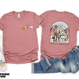 a couple of shirts that are on a table