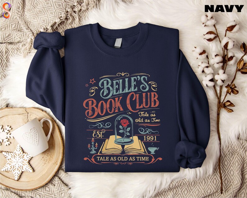 a book club sweatshirt sitting on top of a table