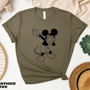a t - shirt with a mickey mouse graphic on it