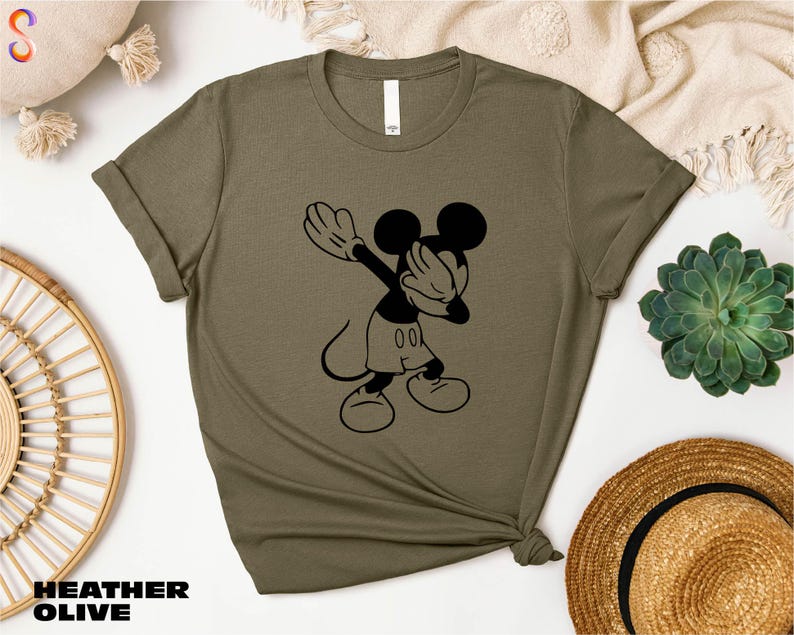 a t - shirt with a mickey mouse graphic on it