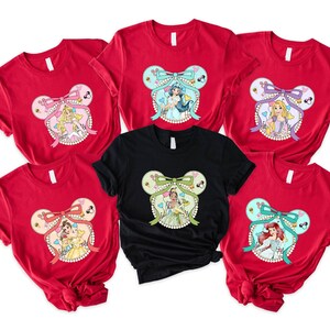 ディズニープリンセスTシャツ、ディズニーランドミッキーヘッドシャツ、ディズニーガールトリップパーカー、プリンセスマッチングセーター、ディズニーバケーションスウェットシャツ