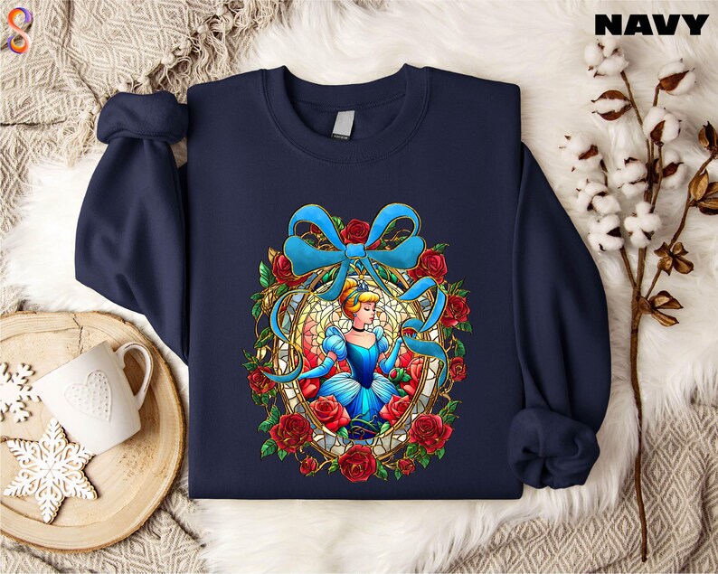 a blue sweatshirt with a picture of a woman with a bow on it