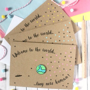 Carte personnalisée pour nouveau-né, Bienvenue dans le monde, petit nouvel humain, avec ornement planète Terre fait main