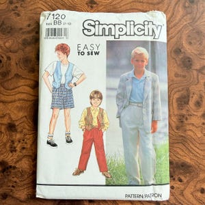 May include: Simplicity sewing pattern 7120 for children's clothing, size BB (7-12). The cover features illustrations of boys in various outfits, including shorts, vests, and suits. The text "EASY TO SEW" is prominently displayed.