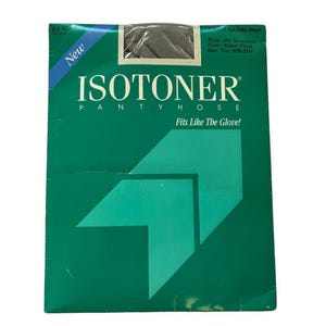 May include: A package of Isotoner pantyhose. The package is green with a blue diagonal banner that reads "New". The text "ISOTONER PANTYHOSE Fits Like The Glove!" is printed on the front. The pantyhose are style 504 Sandalfoot, Silver Cloud, size Tun H29-2315.