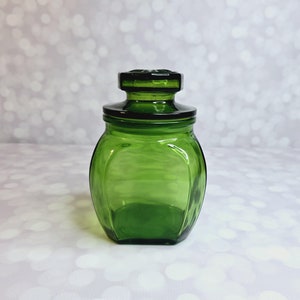 Frasco de boticario de cristal con forma de margarita vintage