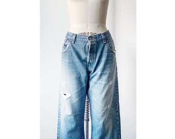 Vintage 90s Levi's 501 Mid Rise Baggy Jeans W36