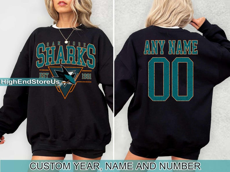 May include: Black sweatshirt with a teal San Jose Sharks logo and the text "San Jose Sharks Est 1991". The back of the sweatshirt has the text "Any Name 00" in teal.