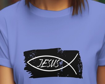 May include: A light blue t-shirt with a black and white graphic of a fish with the word "JESUS" inside.