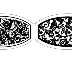 Pode incluir: Padrão damasco preto e branco sobre um fundo branco. O padrão tem a forma de um oval.