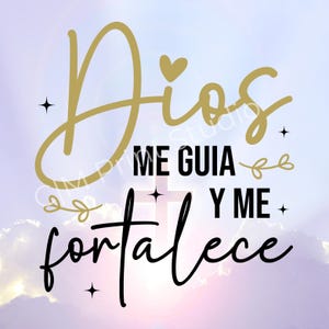 May include: A digital design with the words "Dios me guia y me fortalece" in gold and black script. The design includes a heart and cross, set against a soft, cloudy background.