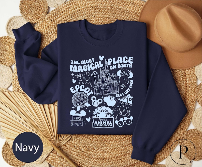 a navy blue sweatshirt with the words the most magic place on it