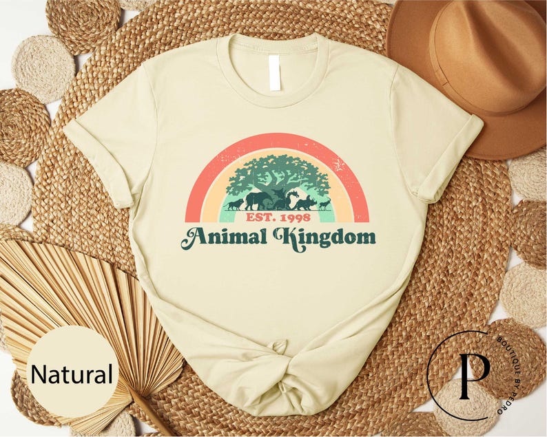 a t - shirt with the words animal kingdom on it