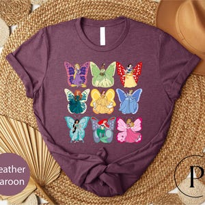 a t - shirt with a picture of a group of cartoon characters on it