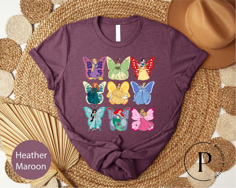 a t - shirt with a picture of a group of cartoon characters on it