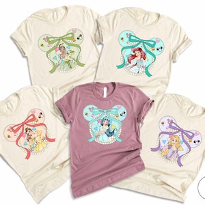 Disney Princess Coquette Bow Shirt, Matching Princess Tees for Girls’ Trips, Featuring Cinderella, Ariel, Belle, Tiana & Rapunzel Sweatshirt