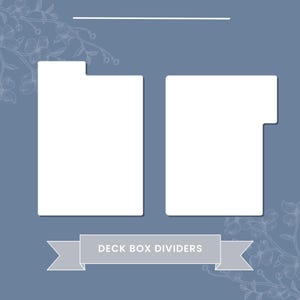 May include: Two white rectangular deck box dividers with notched tabs, set against a muted blue background. The words "DECK BOX DIVIDERS" are displayed on a banner below the dividers. Floral line art decorates the background.