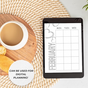 以下が含まれることがあります： 2月のカレンダーとハートのデザインが施された白黒のデジタルプランナー。白い円の中に「CAN BE USED FOR DIGITAL PLANNING!」というテキストがあります。