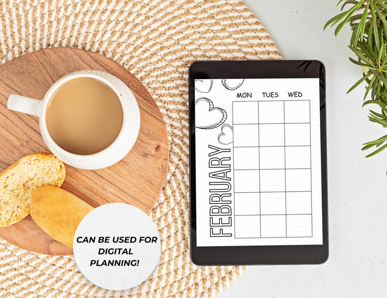 以下が含まれることがあります： 2月のカレンダーとハートのデザインが施された白黒のデジタルプランナー。白い円の中に「CAN BE USED FOR DIGITAL PLANNING!」というテキストがあります。