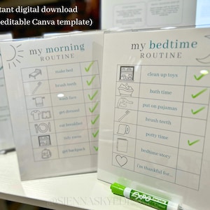 May include: Two white framed routine charts, one for morning and one for bedtime. The morning chart includes a sun graphic and the text "my morning ROUTINE". The bedtime chart includes a moon graphic and the text "my bedtime ROUTINE". A green dry-erase marker is in the foreground.