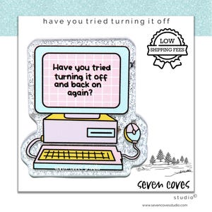 May include: A sticker featuring a retro computer design with the text "Have you tried turning it off and back on again?" The design includes a monitor, keyboard, and mouse, with a pastel color scheme. The sticker also has the text "LOW SHIPPING FEES".