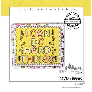 May include: A rectangular, flat-backed badge with the text "I CAN DO HARD THINGS" in a colorful, playful font. The badge has a yellow background with floral accents and a decorative border. The image also includes a "LOW SHIPPING FEES" badge.